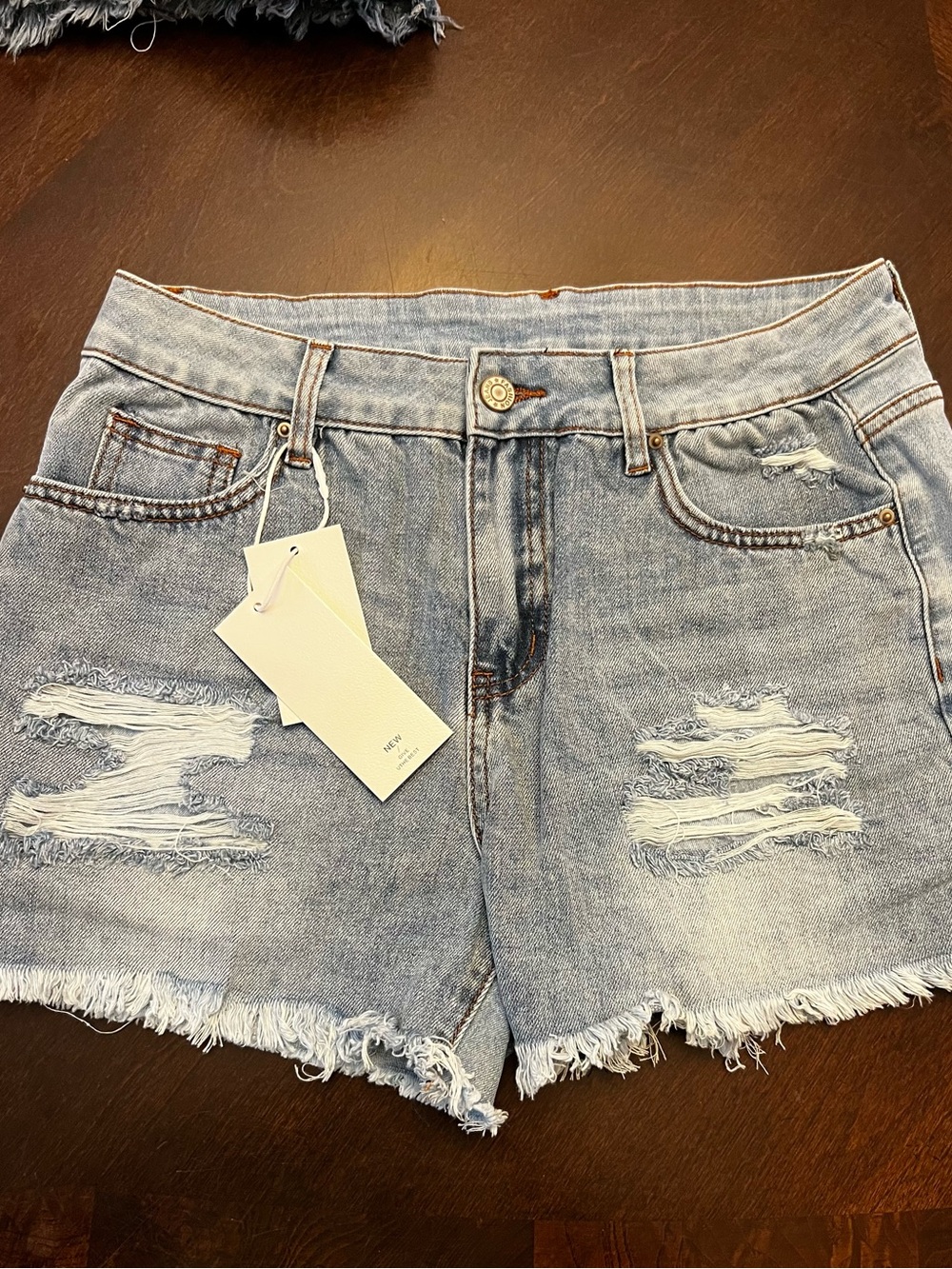Light Blue Distressed Denim Women’s Shorts